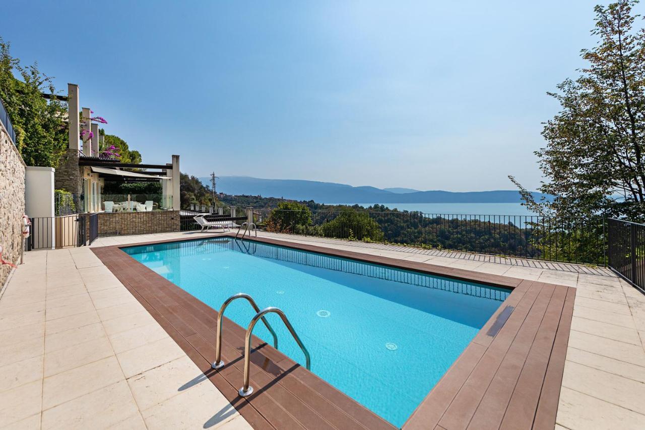 La Bouganville P1-1 Apartment By Wonderful Italy Тосколано Мадерно Екстериор снимка